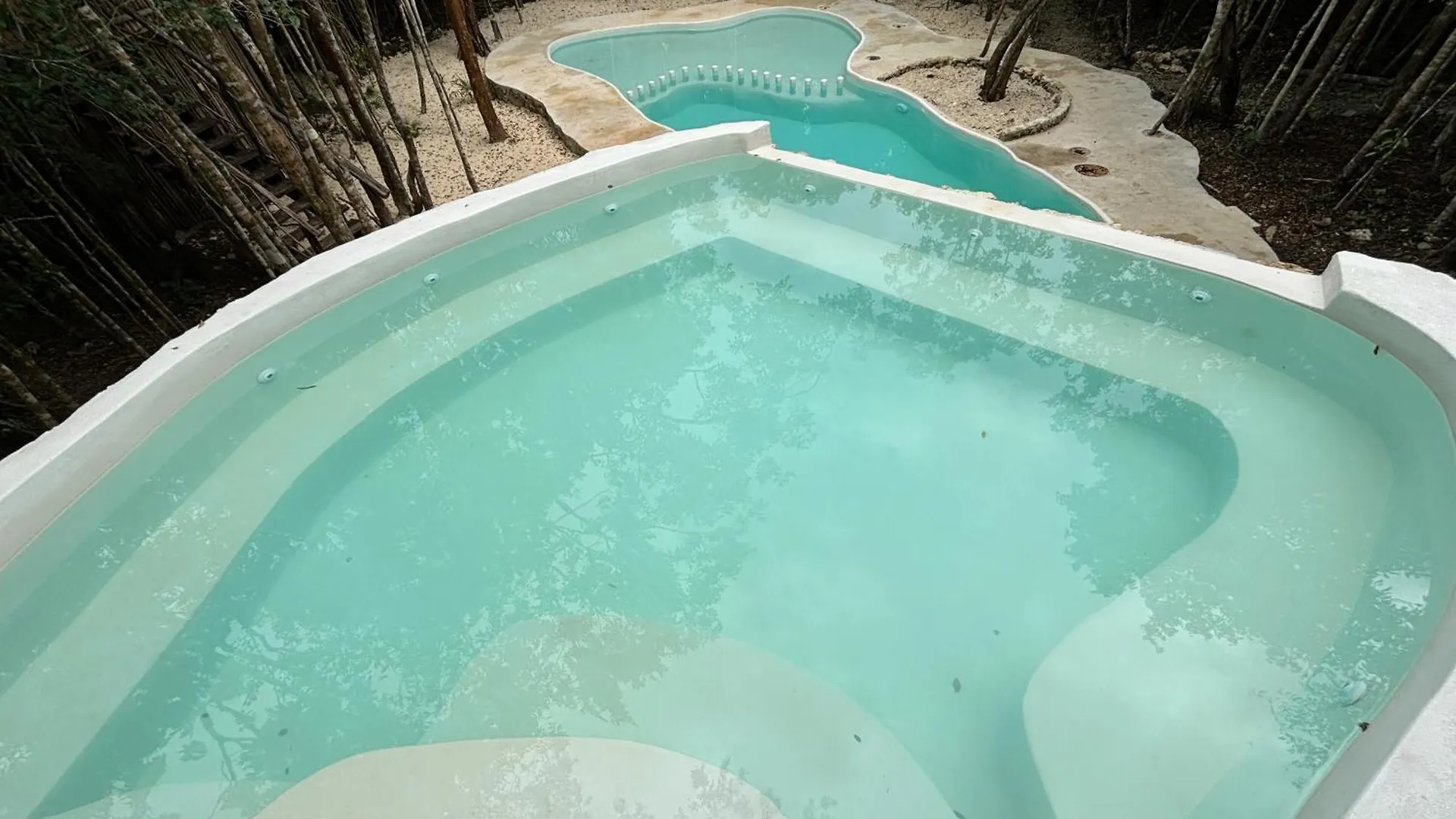 Camping Aldea Maya-Ha Cabañas con cenotes Puerto Morelos